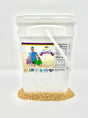 A white plastic bucket labeled with the product name and an image of wheat berries, indicating that it contains 23 lb of soft white wheat berries which are non-GMO, kosher, chemical-free, and have a 25-year shelf-life.